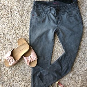 Grey cropped Levi jeans